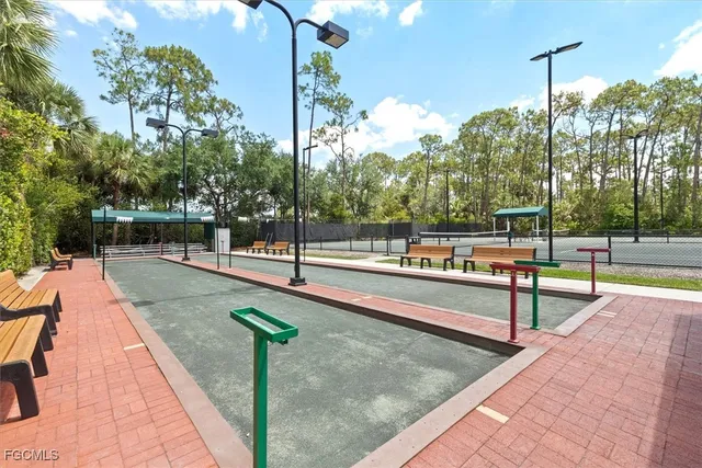 a view of a swimming pool with a fountain