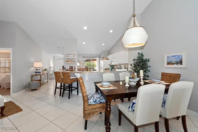a kitchen with white cabinets sink and white appliances