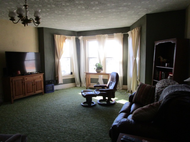 951 Kiddsville Road Waynesboro, VA 22980 - Photo 24 of 29 a living room with furniture and a flat screen tv