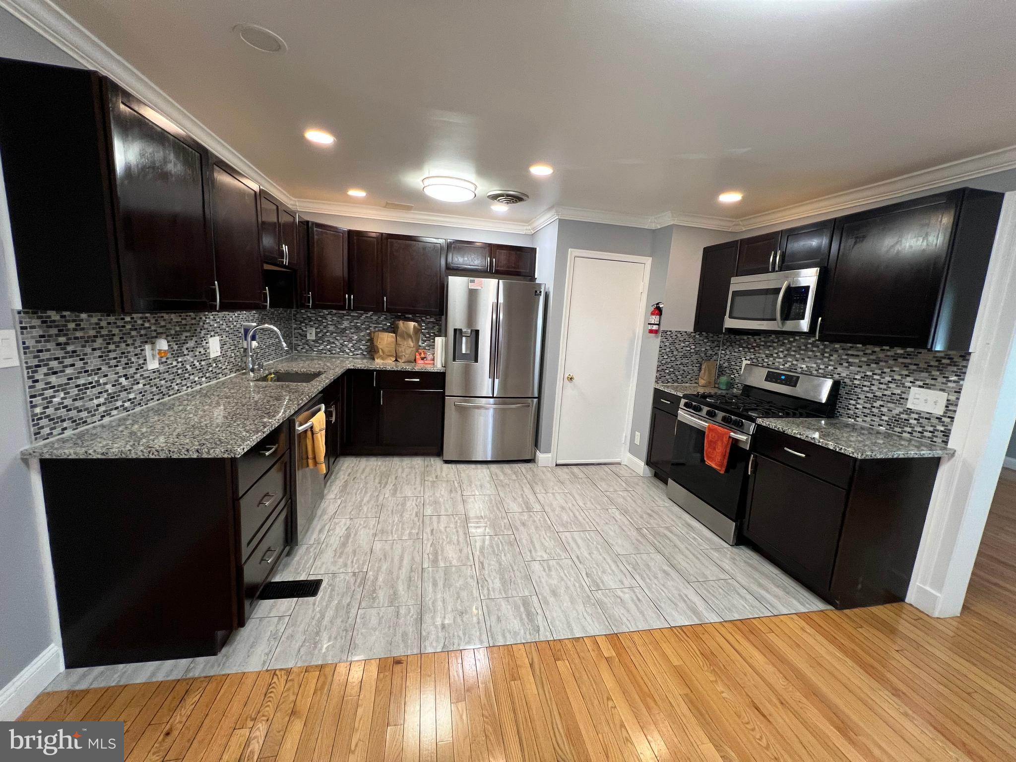 12220 Centerhill Street Silver Spring, MD 20902 - Photo 13 of 73 First floor - main kitchen; ceramic floor 2022