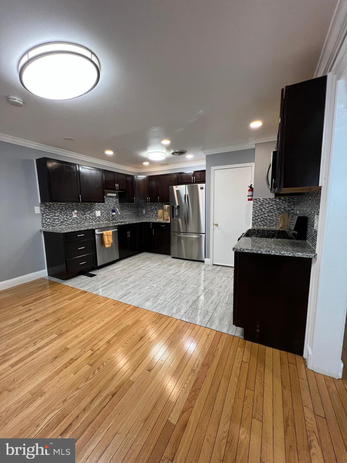 12220 Centerhill Street Silver Spring, MD 20902 - Photo 15 of 73 Granite countertops and stainless steel