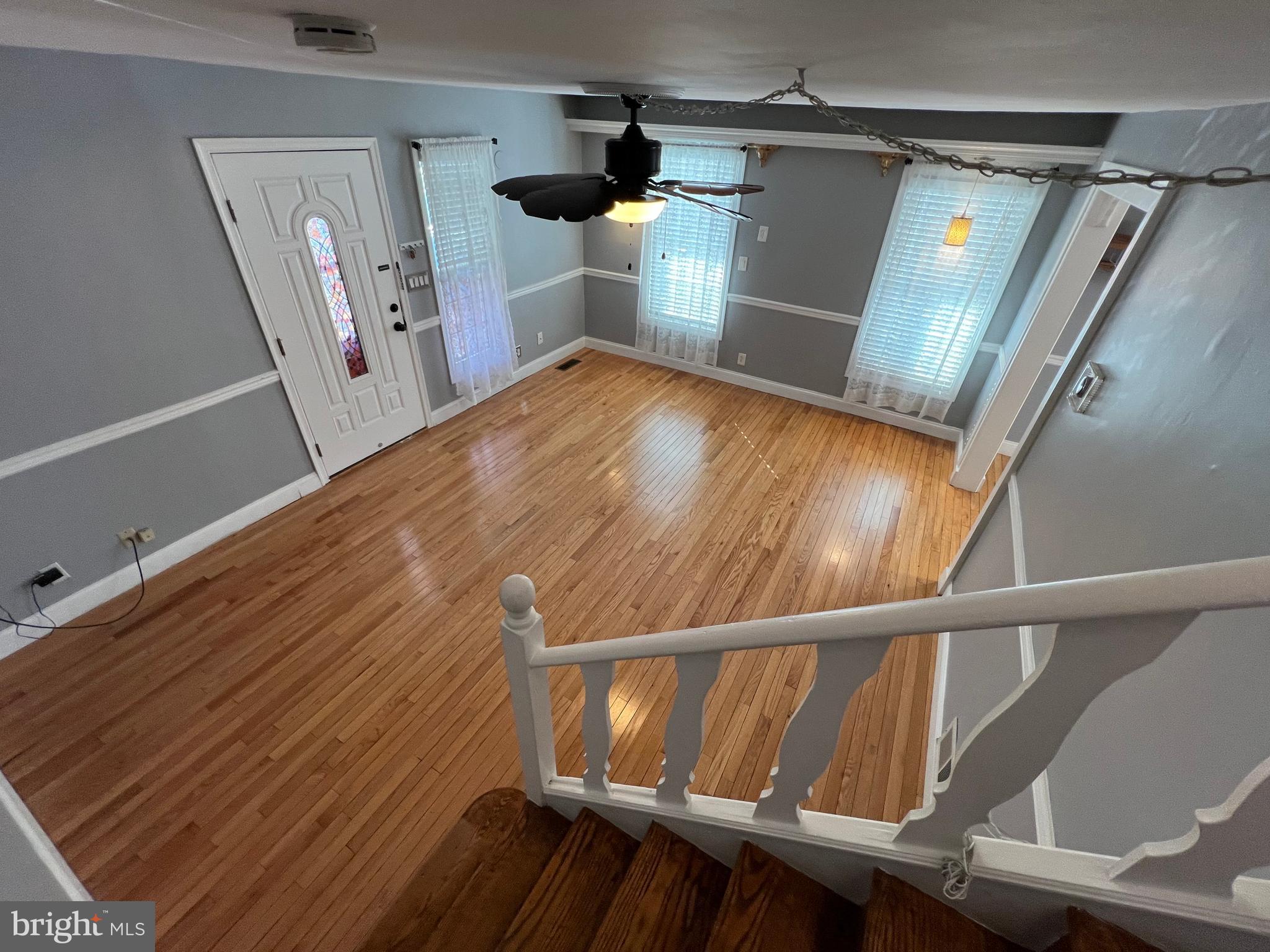 12220 Centerhill Street Silver Spring, MD 20902 - Photo 42 of 73 View of LR in main house from stairs to second flr
