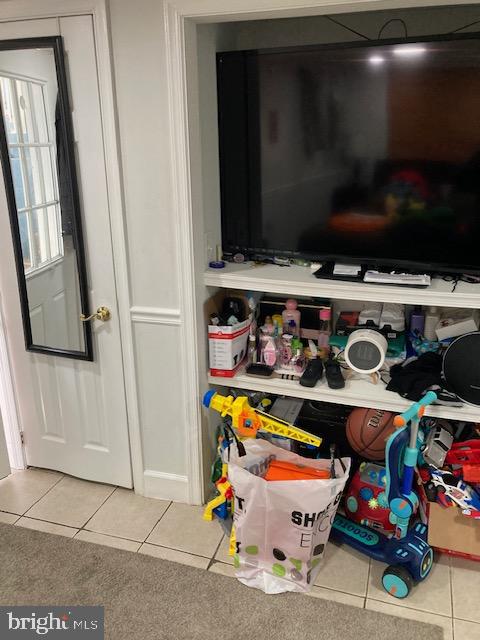 12220 Centerhill Street Silver Spring, MD 20902 - Photo 66 of 73 Entertainment wall of lower level studio apt.