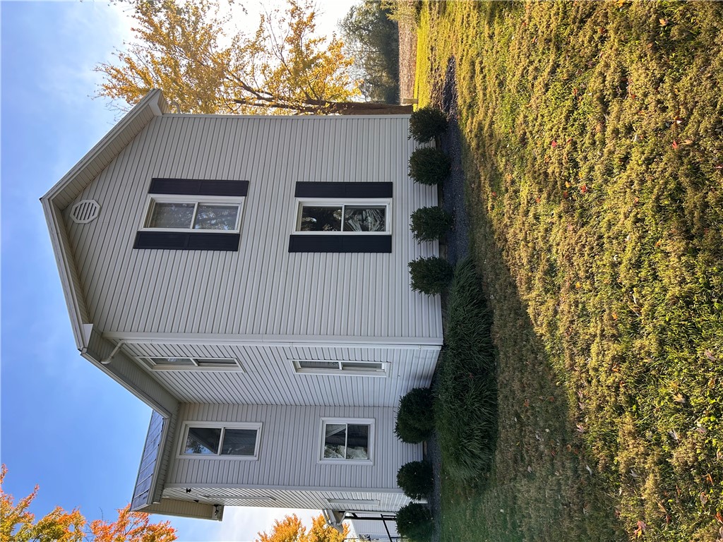 2086 Scheyhing Road Lewisburg, OH 45338 - Photo 3 of 29 This classic white siding home features well-maintained landscaping and a spacious yard.