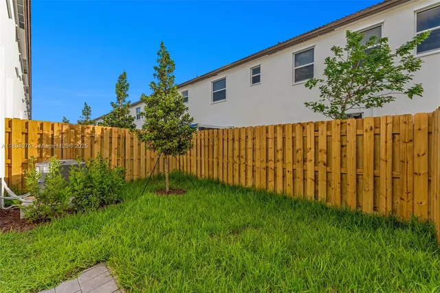 a house view with a garden space