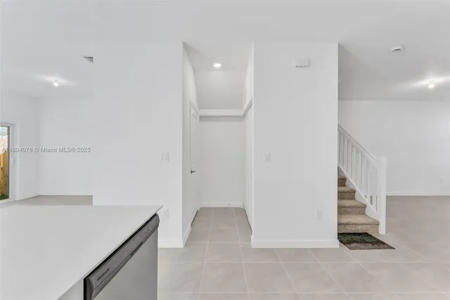 a view of hallway with stairs