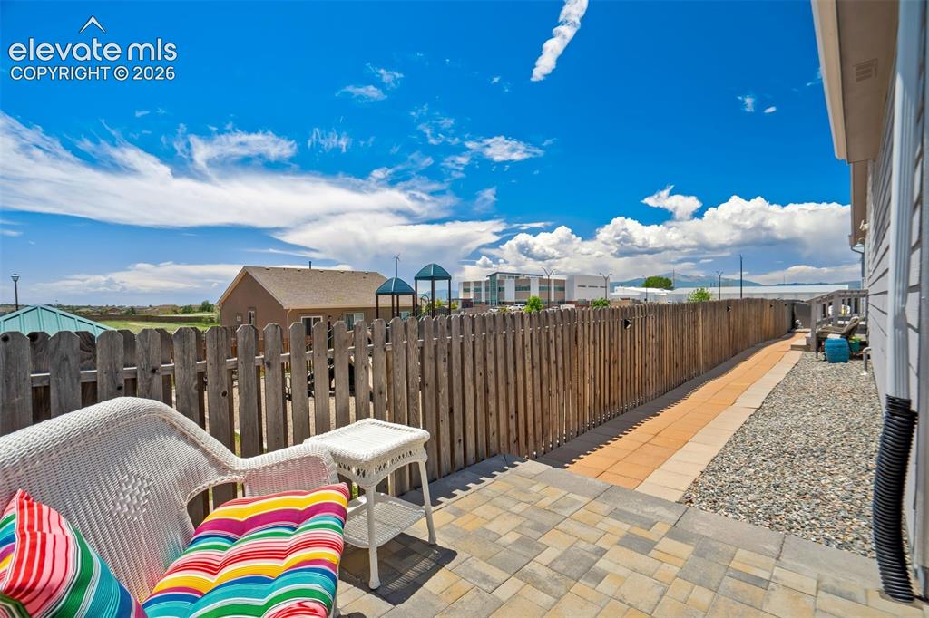 11321 Method Point Peyton, CO 80831 - Photo 40 of 47 Fully xero-scaped with pavers and rock for low maintenance.