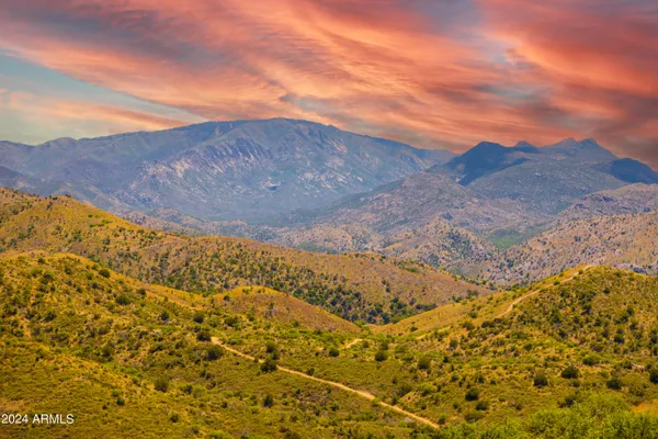 a view of an outdoor space and a mountain