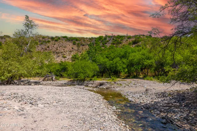 a view of a road with a yard