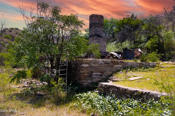 a view of a lake with a building in the background