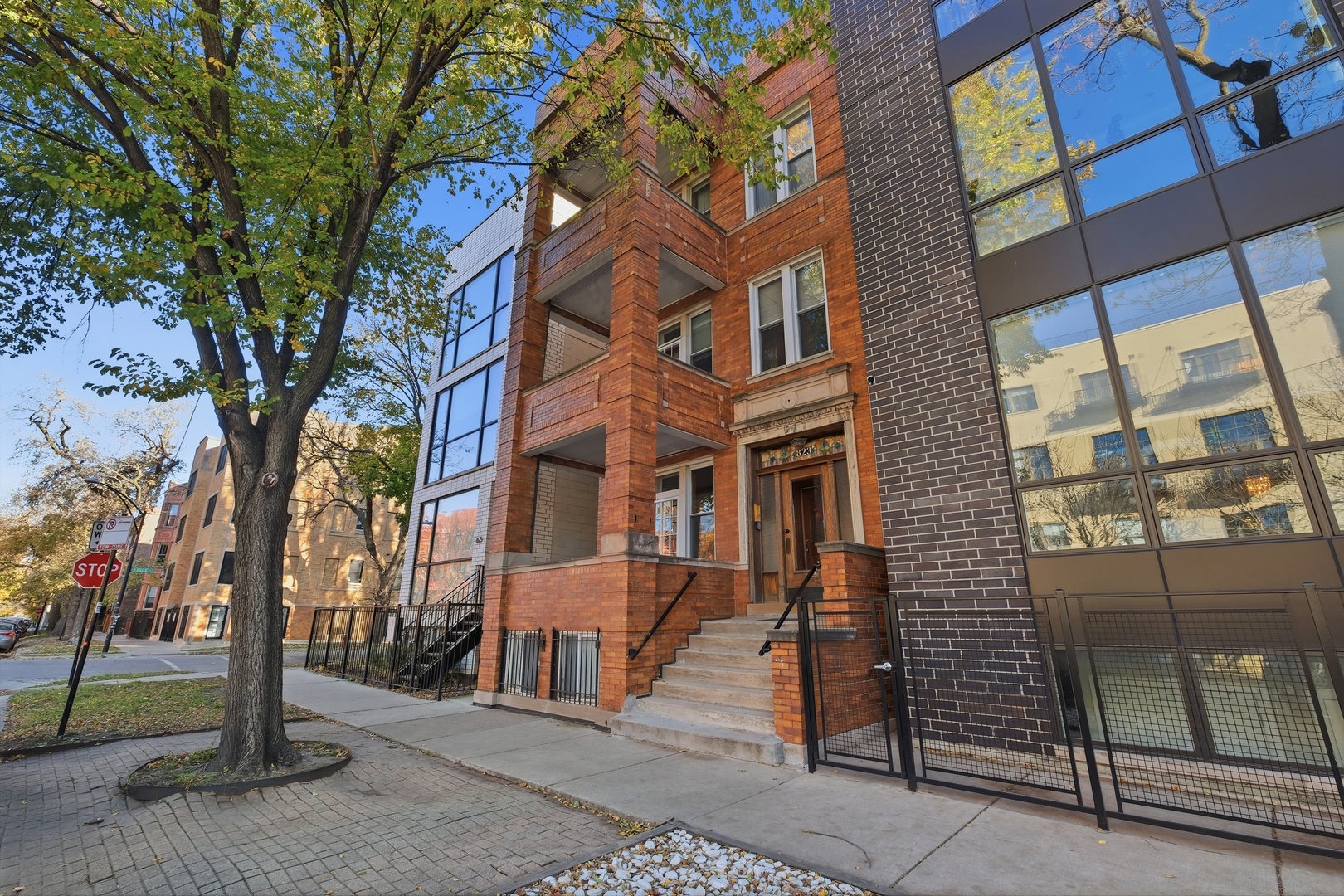 823 North Hoyne Avenue, Unit 2 Chicago, IL 60622 - Photo 1 of 20 a front view of a building with a garden