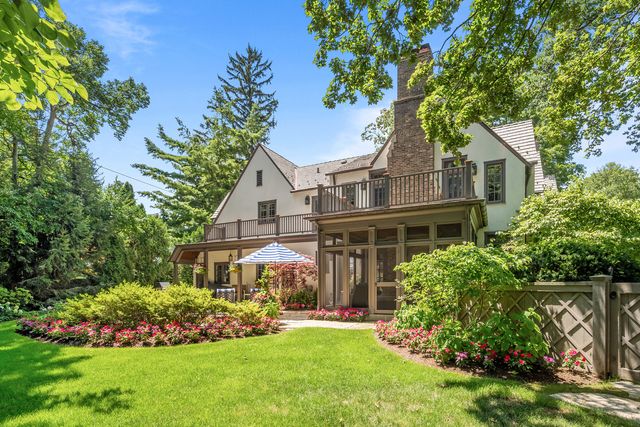a view of an entryway with wooden floor and stairs