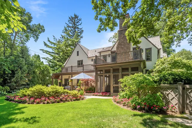 a view of an entryway with wooden floor and stairs