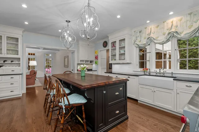 a kitchen that has a sink and a stove