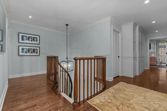 a workspace room with furniture and a window