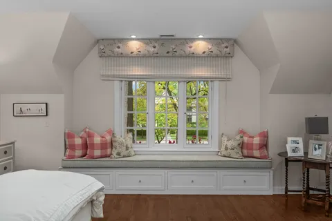 a living room with furniture fireplace and flat screen tv