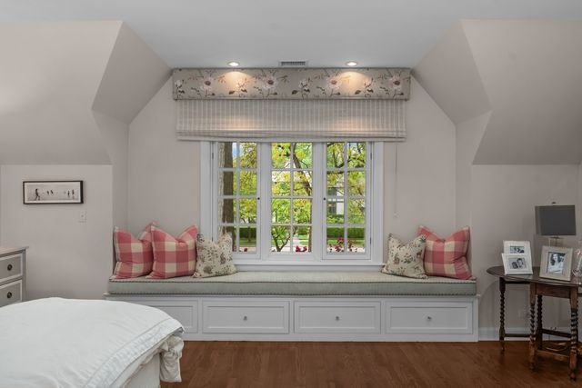 a living room with furniture fireplace and flat screen tv