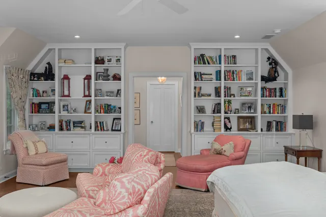 a view of a kitchen with cabinets and wooden floor
