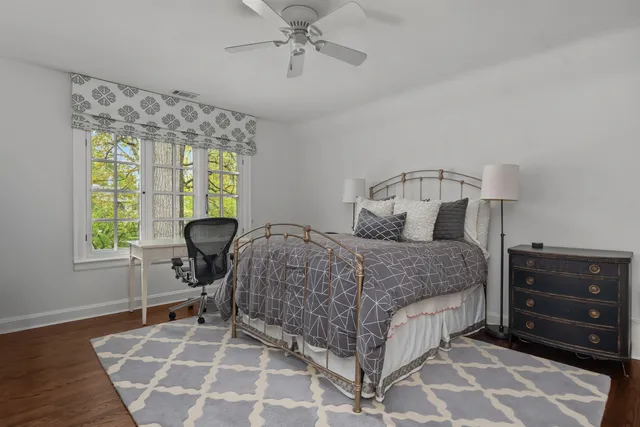 a bathroom with a sink and a window