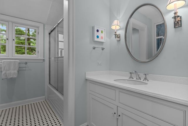 a utility room with sink dryer and washer