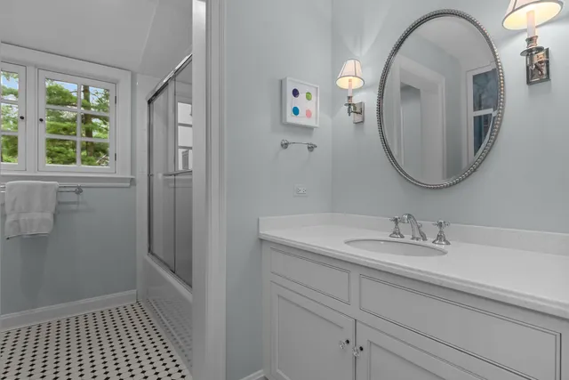 a utility room with sink dryer and washer