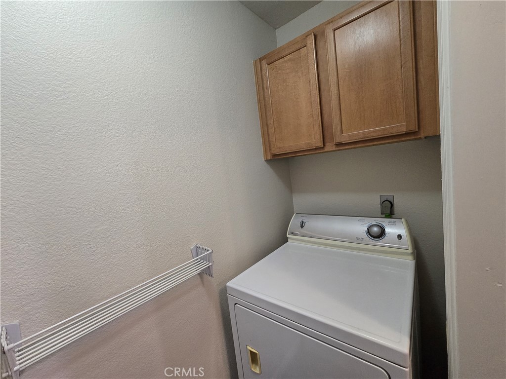 375 Central Avenue, Unit 14 Riverside, CA 92507 - Photo 11 of 22 a utility room with dryer and washer