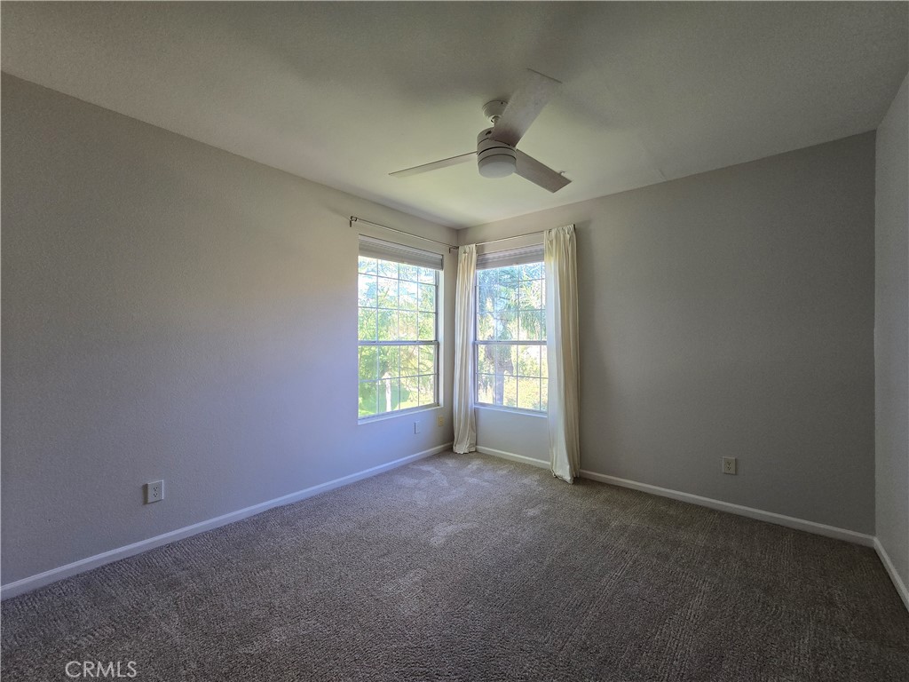 375 Central Avenue, Unit 14 Riverside, CA 92507 - Photo 13 of 22 an empty room with a empty space and windows