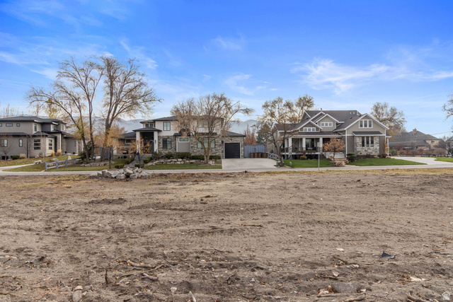12959 South Fort Street Draper, UT 84020 - Photo 19 of 20 Craftsman-style home featuring a residential view and driveway