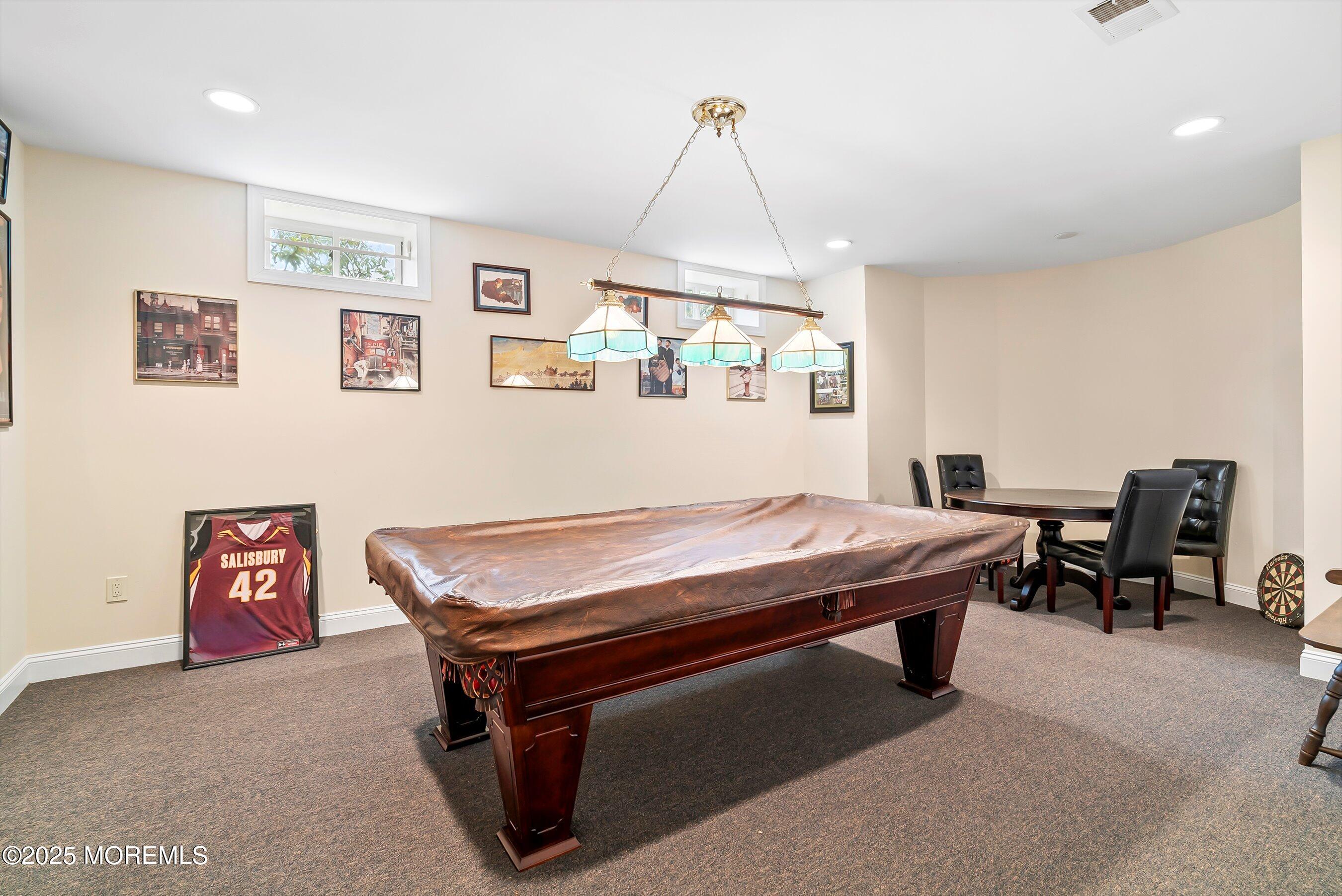 39 Primrose Lane Colts Neck, NJ 07722 - Photo 8 of 52 a room with furniture pool table and a window