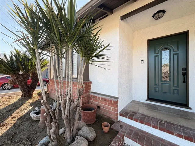 a view of a porch with seating space