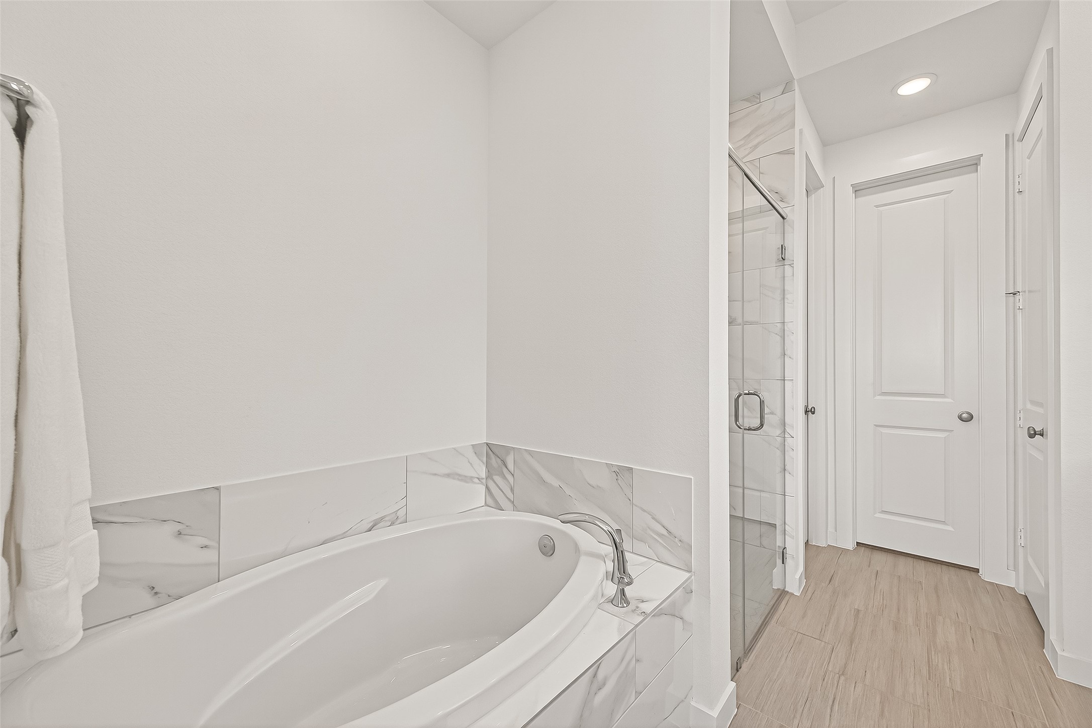 7427 Compass Drive Katy, TX 77493 - Photo 24 of 49 a bathroom with a tub and shower