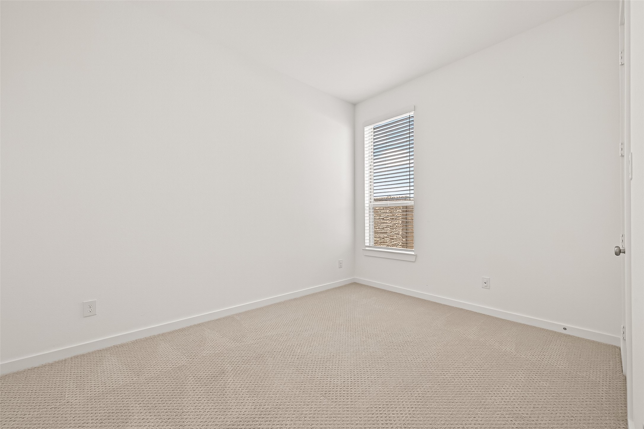 7427 Compass Drive Katy, TX 77493 - Photo 31 of 49 a view of an empty room with a window