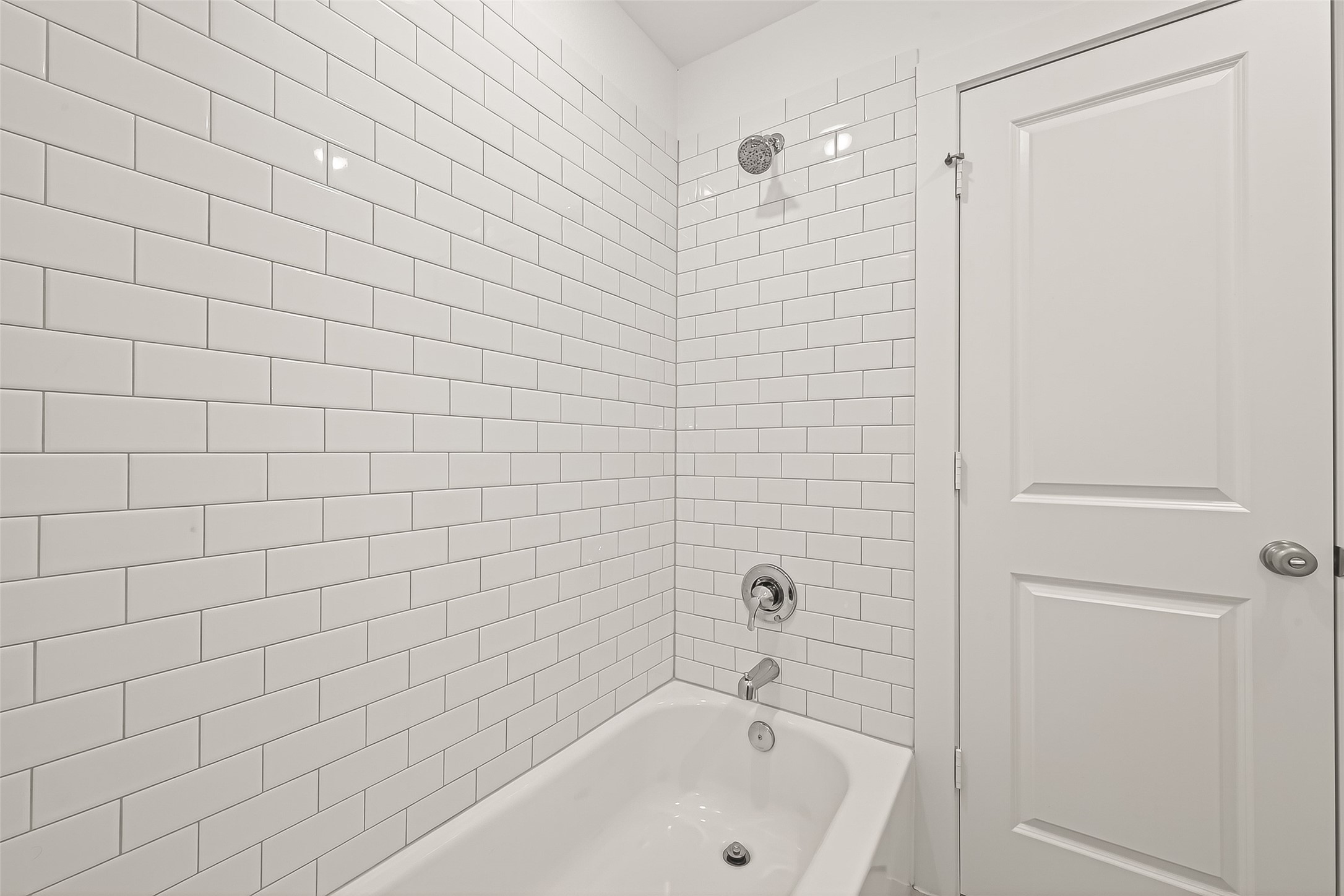 7427 Compass Drive Katy, TX 77493 - Photo 39 of 49 a bathroom with a bathtub