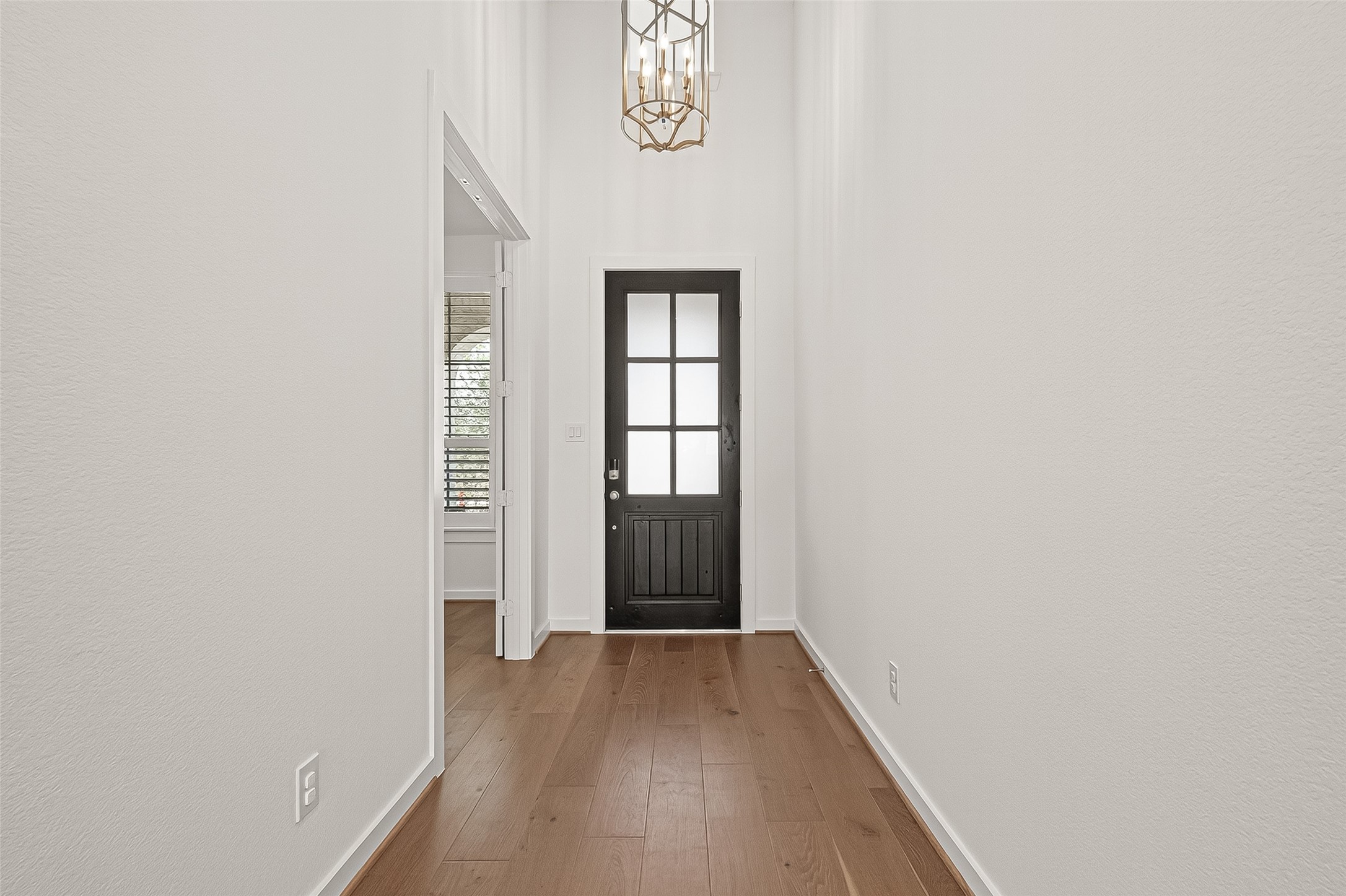 7427 Compass Drive Katy, TX 77493 - Photo 7 of 49 a view of an entryway with wooden floor
