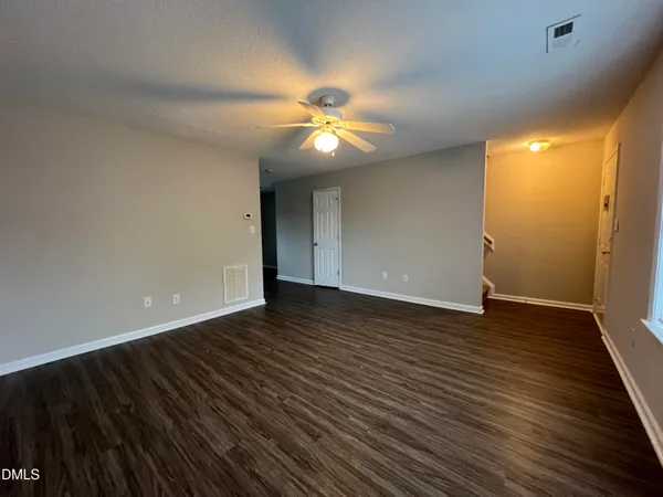 a kitchen with stainless steel appliances granite countertop a stove a sink dishwasher and a refrigerator