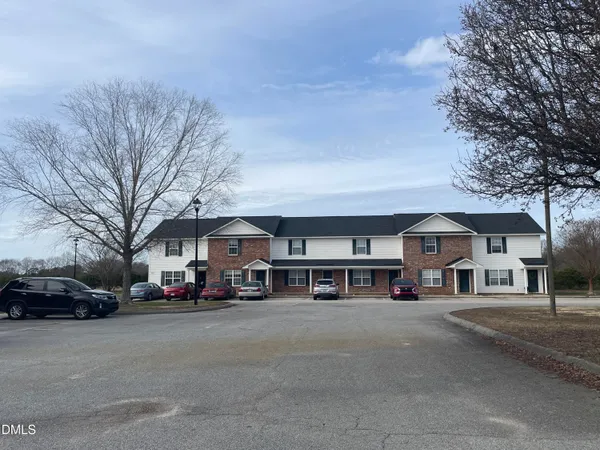 a view of a car parked in front of building