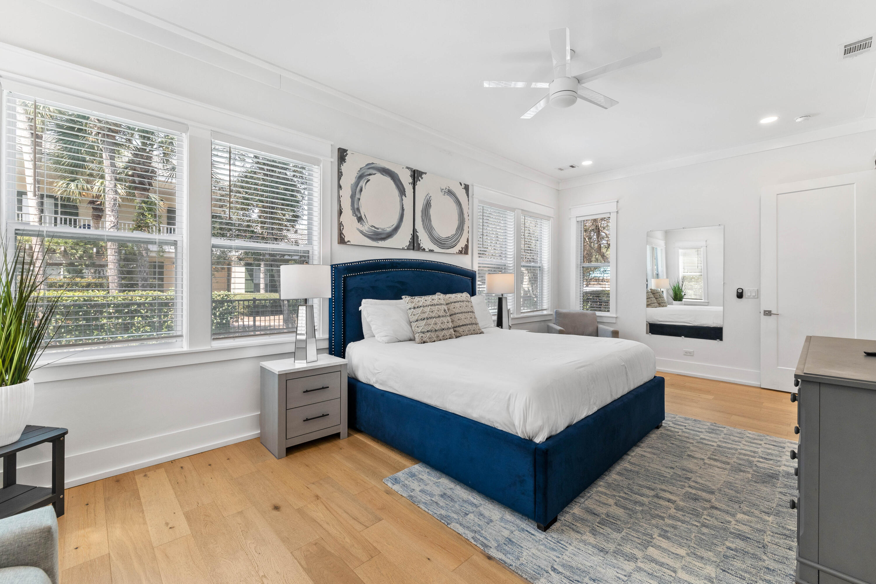 4635 Sunset Pointe Destin, FL 32541 - Photo 11 of 48 a spacious bedroom with a large bed and a large window