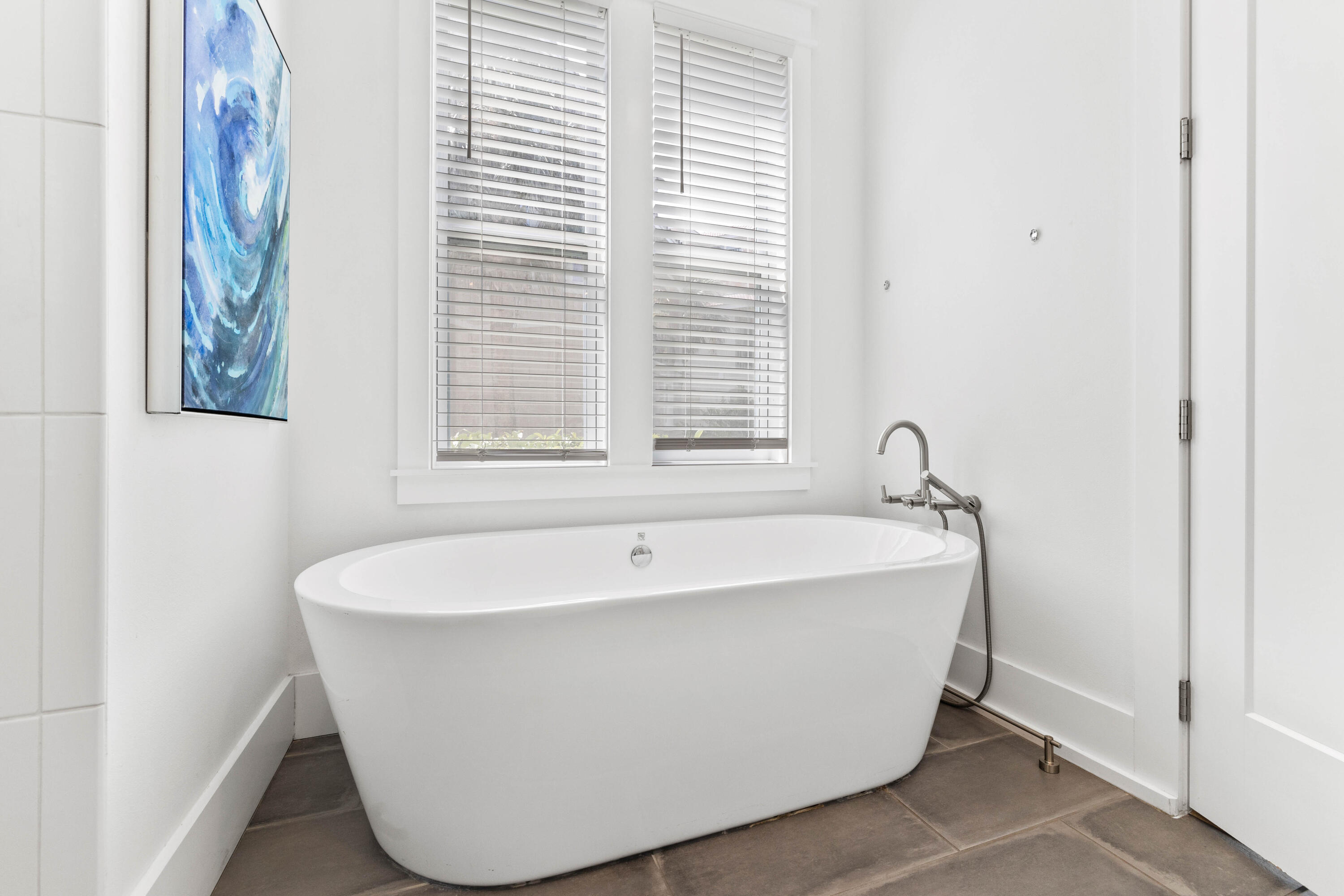 4635 Sunset Pointe Destin, FL 32541 - Photo 15 of 48 a white bath tub sitting in a bathroom