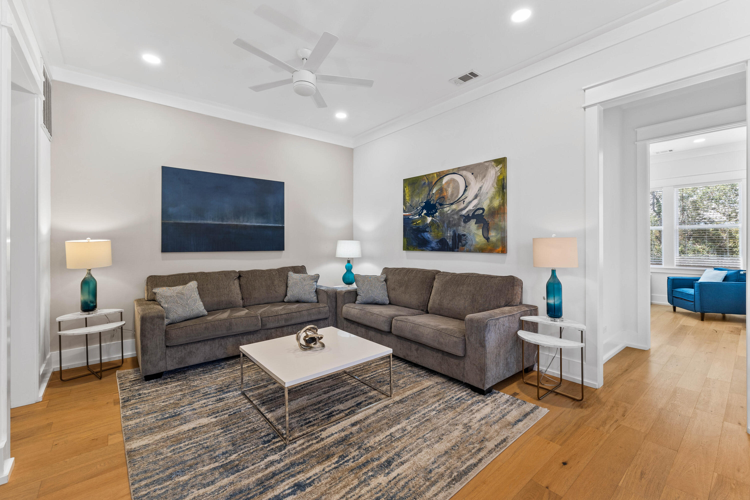 4635 Sunset Pointe Destin, FL 32541 - Photo 19 of 48 a living room with furniture and a wooden floor
