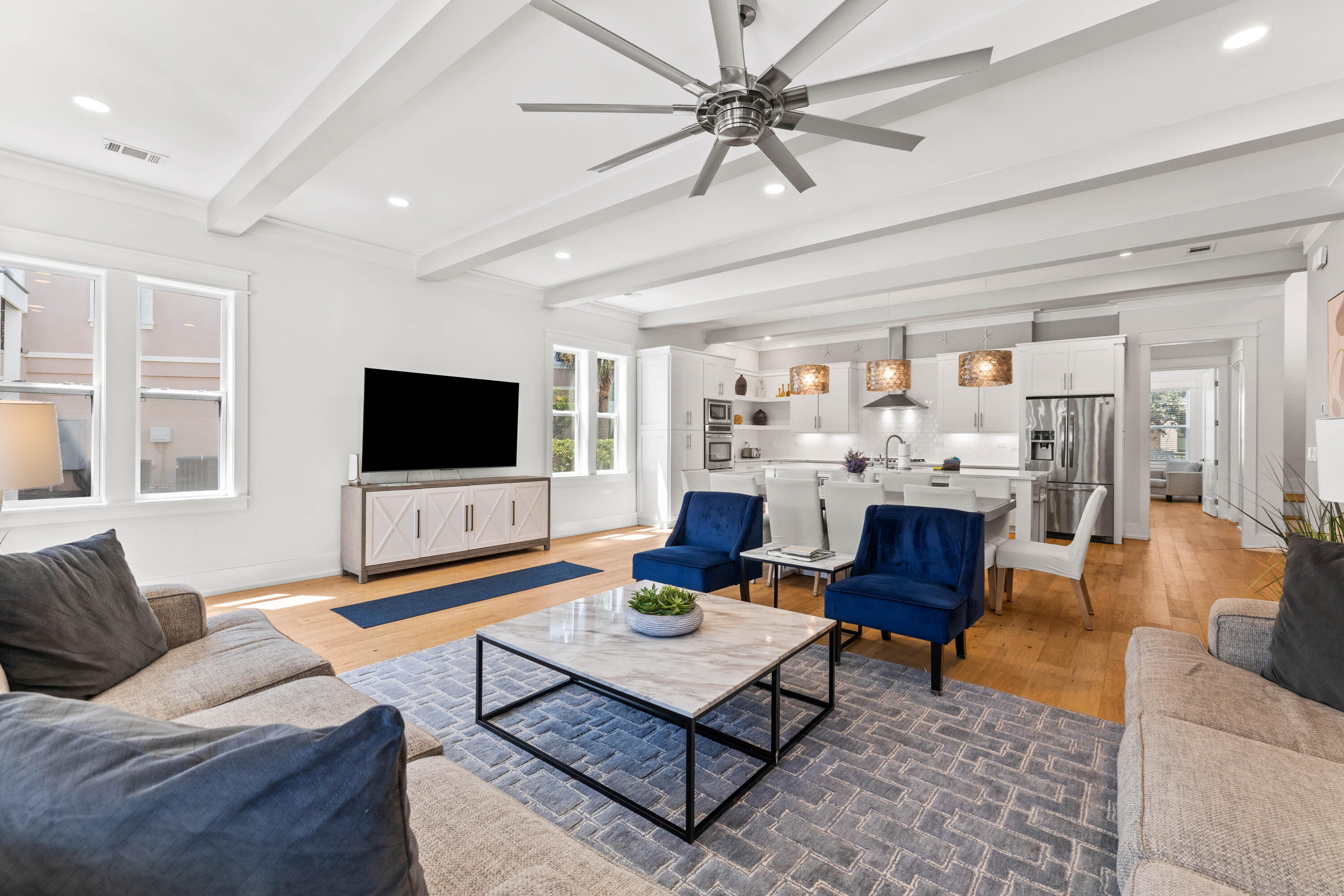 4635 Sunset Pointe Destin, FL 32541 - Photo 3 of 48 a living room with furniture and a flat screen tv