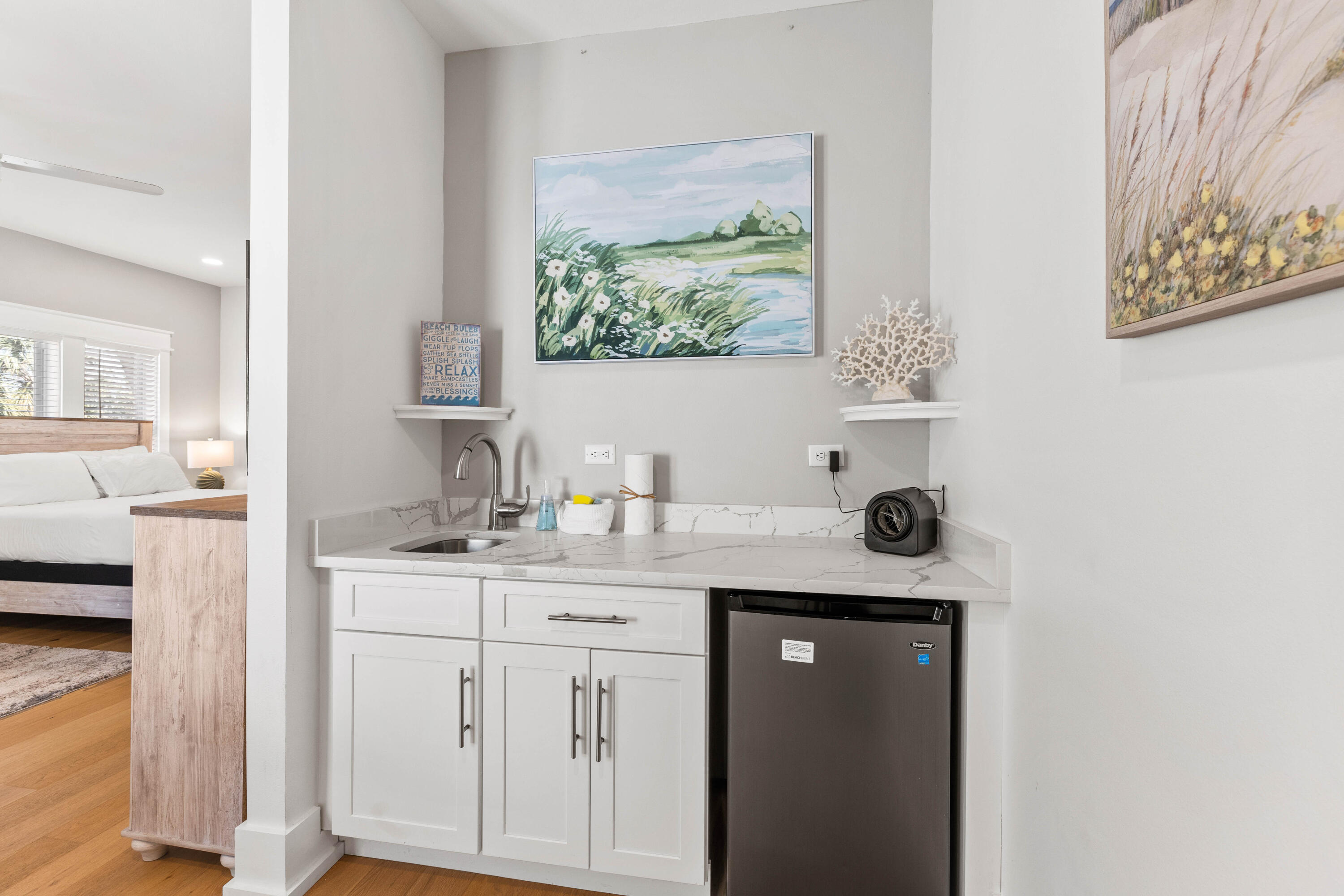 4635 Sunset Pointe Destin, FL 32541 - Photo 35 of 48 a view of cabinets a sink and a window in a room