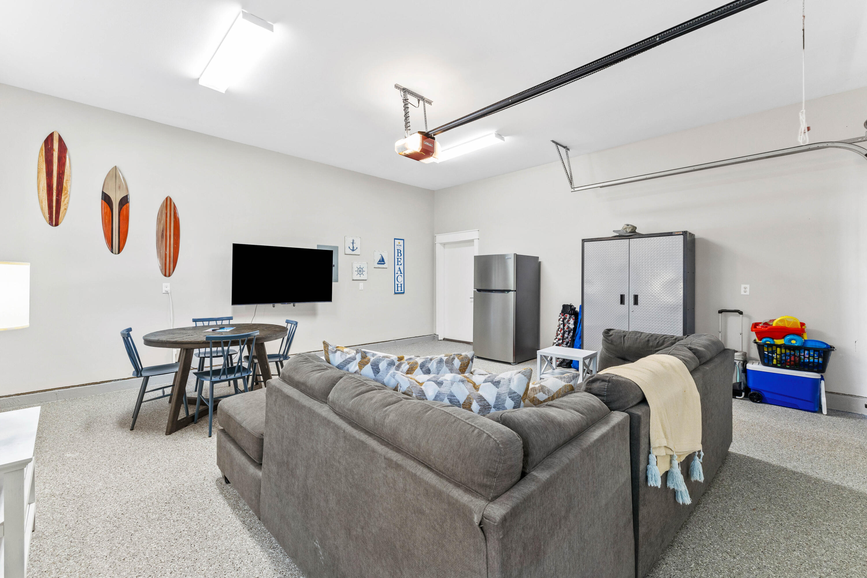 4635 Sunset Pointe Destin, FL 32541 - Photo 36 of 48 a living room with furniture and a flat screen tv