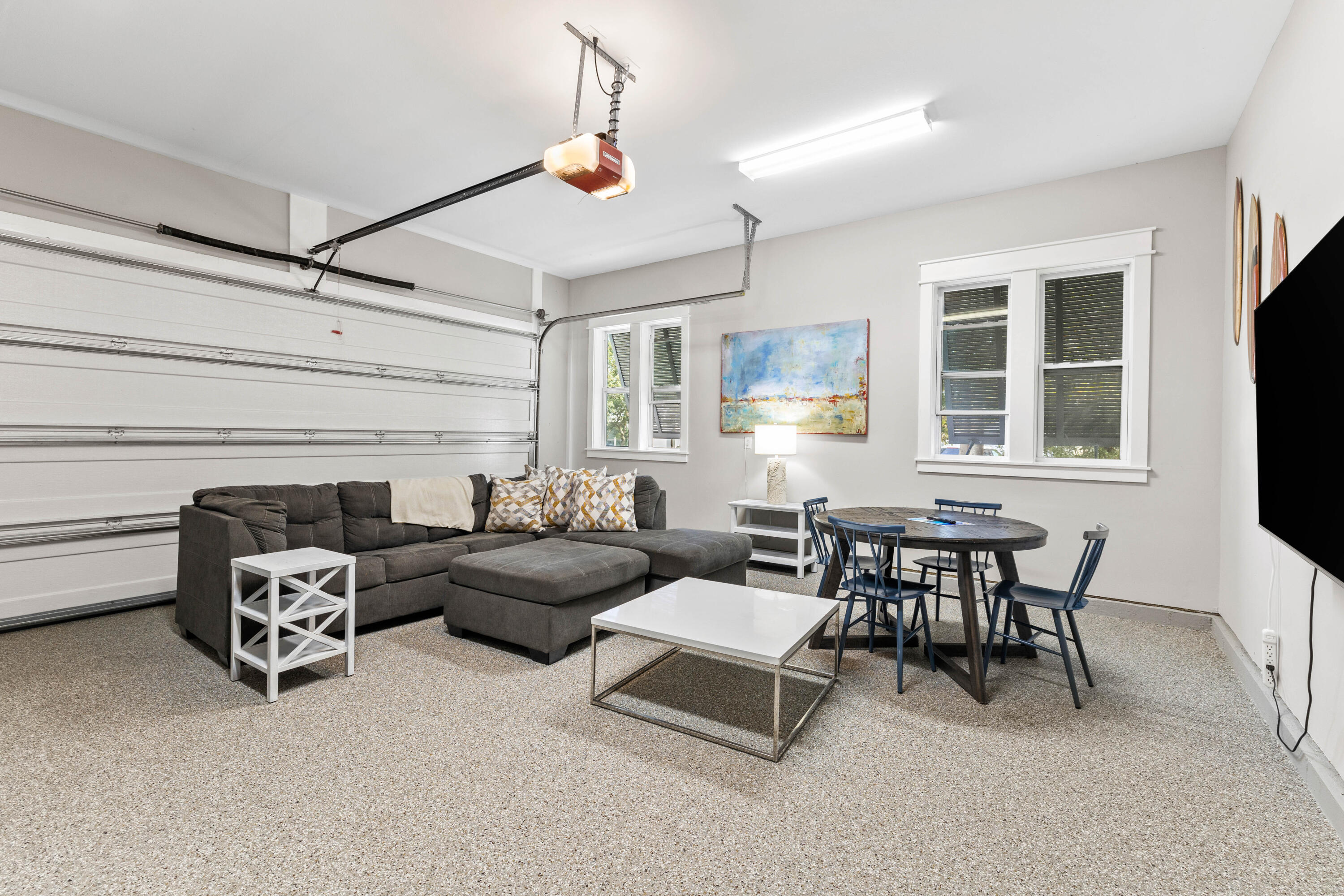 4635 Sunset Pointe Destin, FL 32541 - Photo 37 of 48 a living room with furniture a flat screen tv and a window