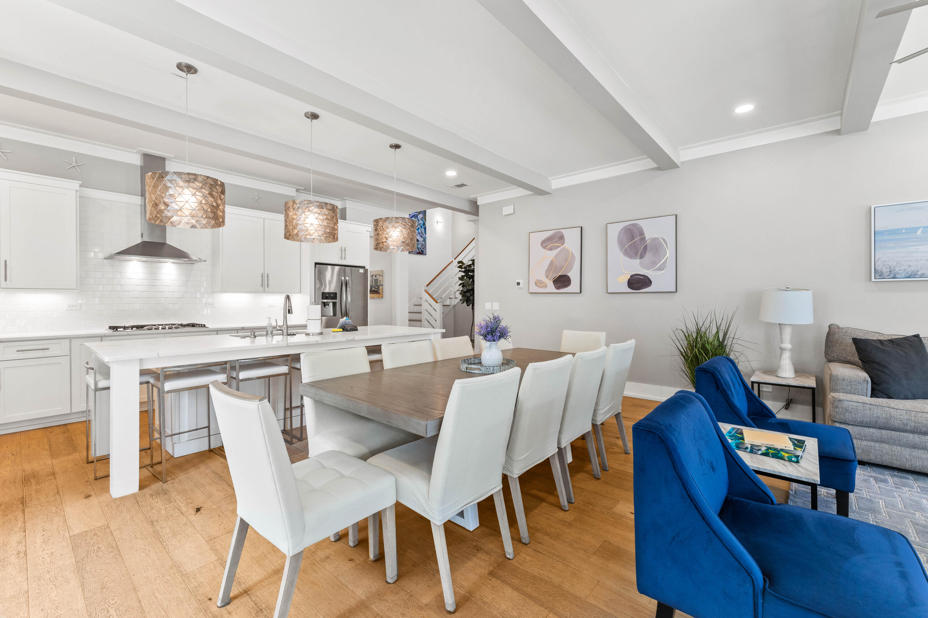 4635 Sunset Pointe Destin, FL 32541 - Photo 4 of 48 a dining room with furniture and wooden floor