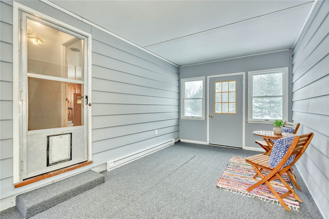 572 Holt Road Webster, NY 14580 - Photo 6 of 39 The finished & heated breezeway has easy access to