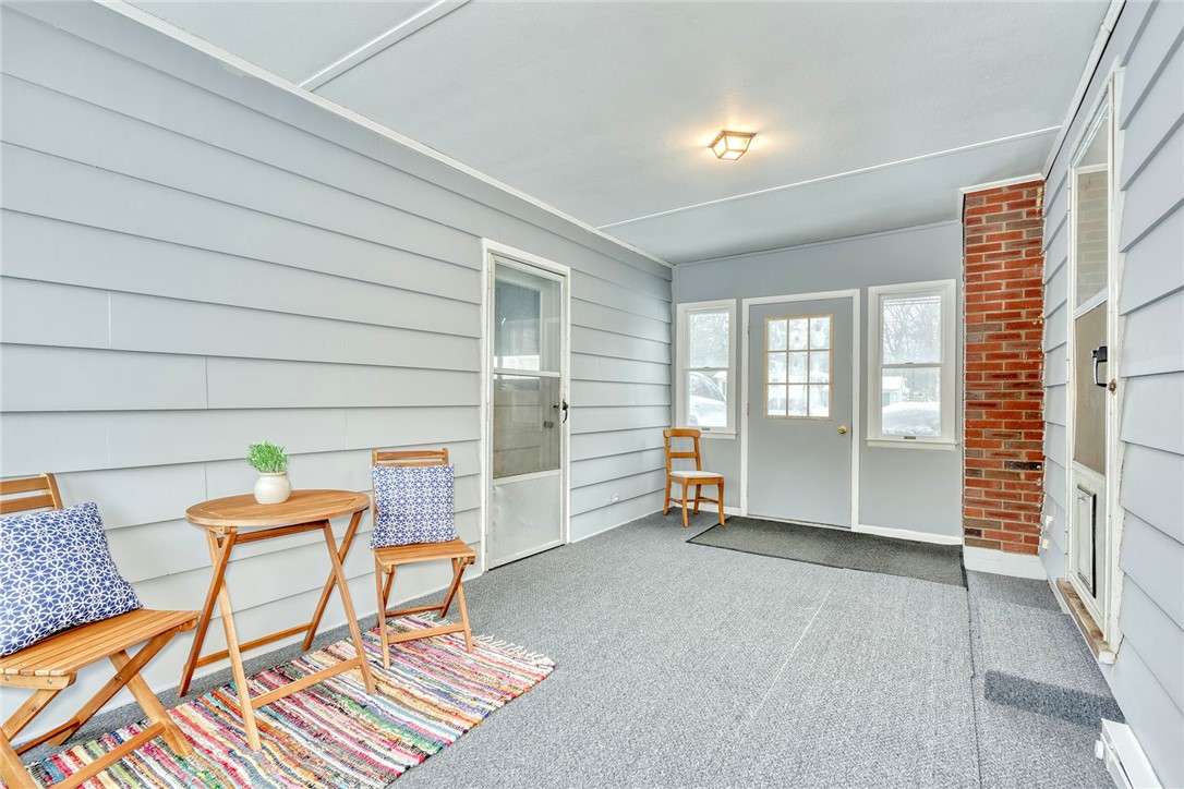 572 Holt Road Webster, NY 14580 - Photo 7 of 39 The finished and heated breezeway is perfect to en