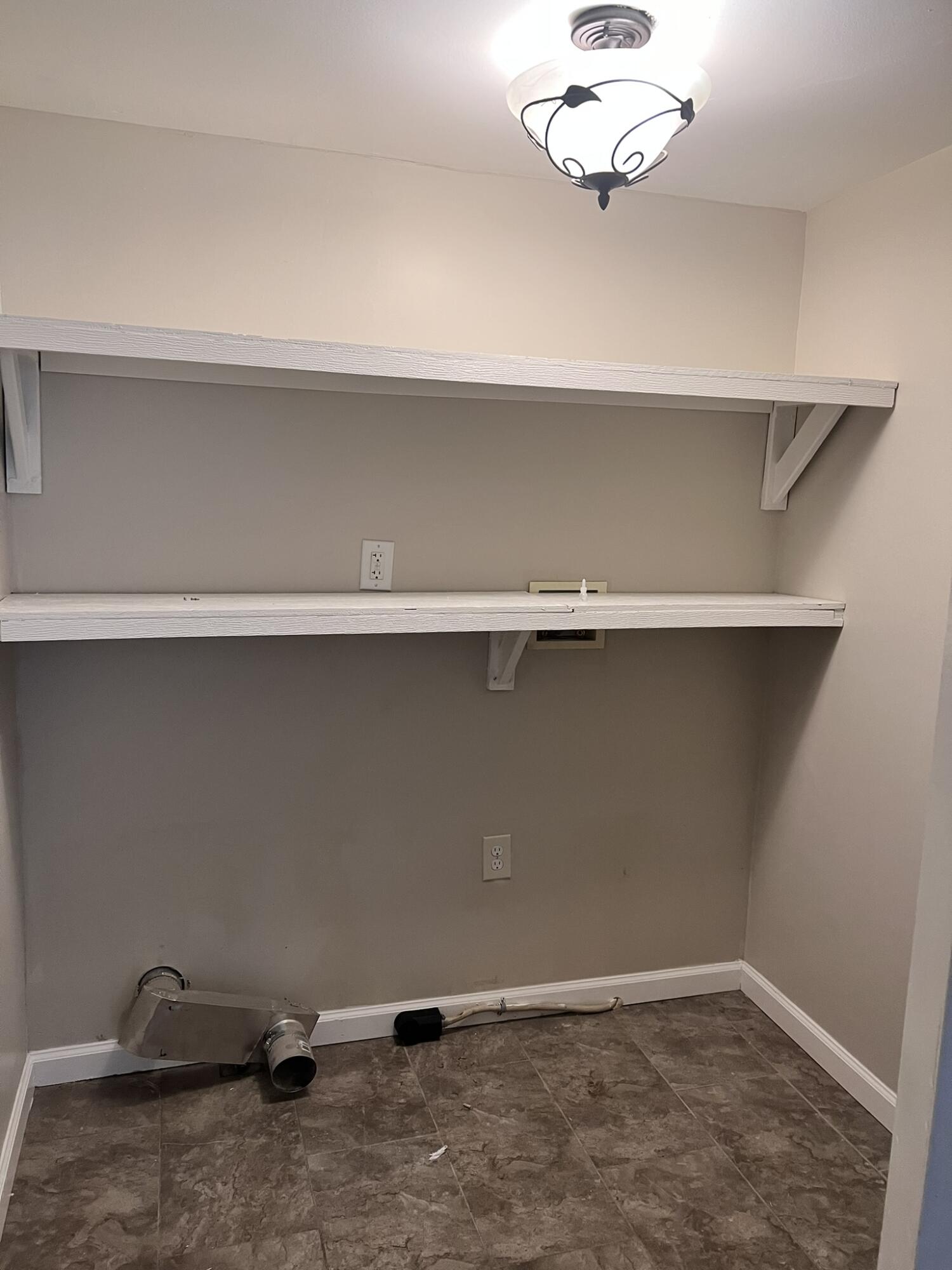 2361 Susan Drive Crestview, FL 32536 - Photo 11 of 12 a view of a small space with a cabinets