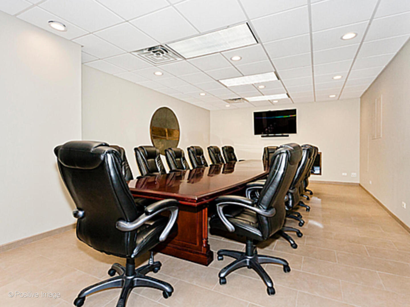 1030 North State Street, Unit 9G Chicago, IL 60610 - Photo 19 of 20 a view of a workspace with furniture and a window