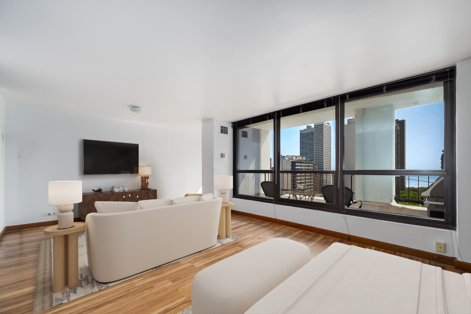 1030 North State Street, Unit 9G Chicago, IL 60610 - Photo 9 of 20 a living room with furniture and a flat screen tv