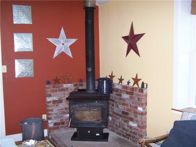 498 Mt Ephraim Road Searsport, ME 04974 - Photo 10 of 16 Living Room. Living Room woodstove...